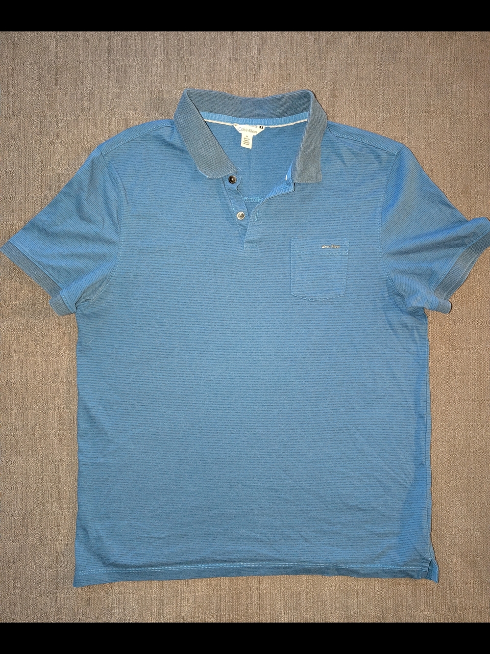 Calvin Klein Light Blue Men's Polo Shirt with Contrast Collar